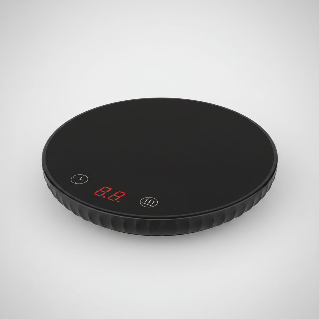 Black round electronic device with digital display on a white background, labeled '110V US'.