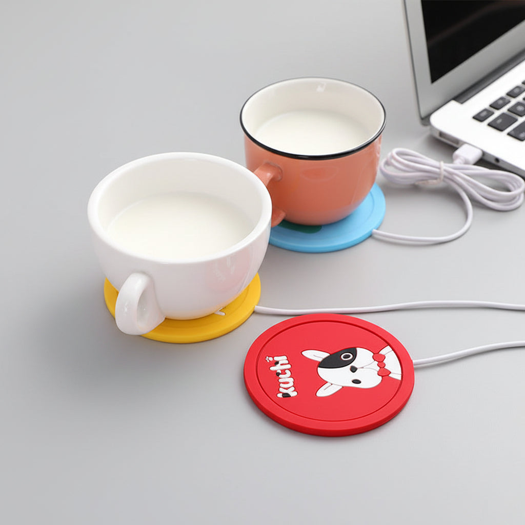 Colorful mug warmers on a desk with a laptop and charger.