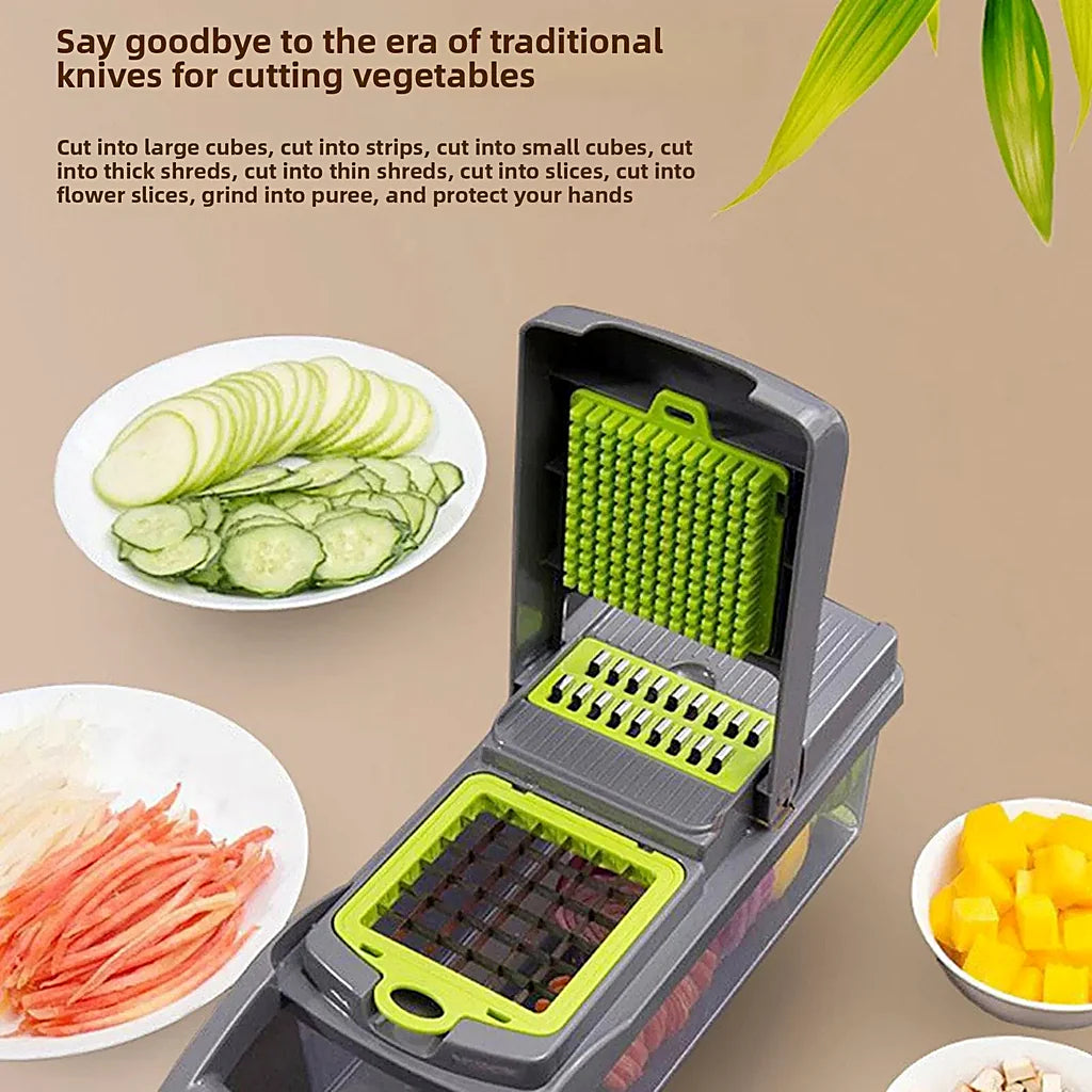 Vegetable chopper with open lid beside plates of sliced zucchini, cucumber rounds, julienned carrot and cubed mango
