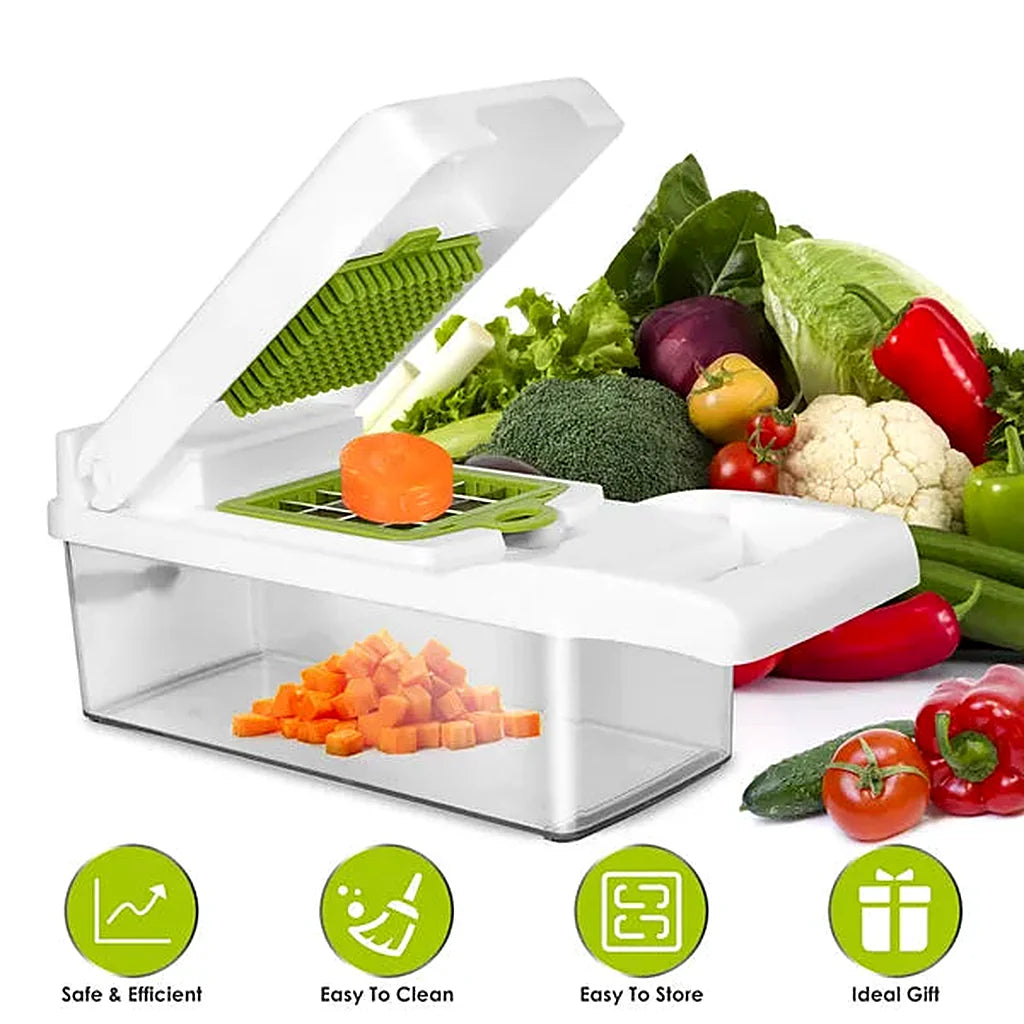White vegetable chopper with a carrot piece on the dicing grid and diced carrot in the container, fresh vegetables behind it