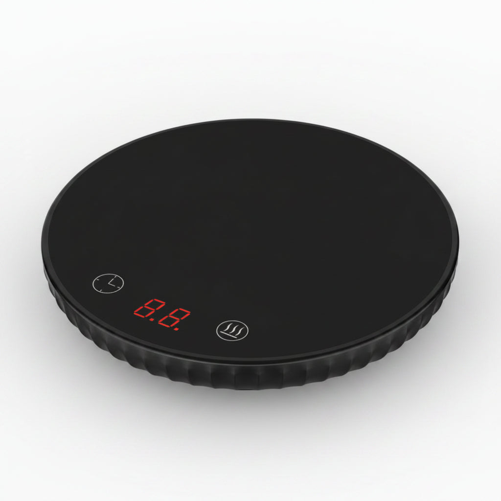 Black digital kitchen scale with a digital display on a white background
