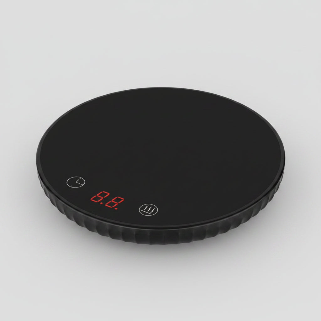 Black digital kitchen scale with a digital display on a white background