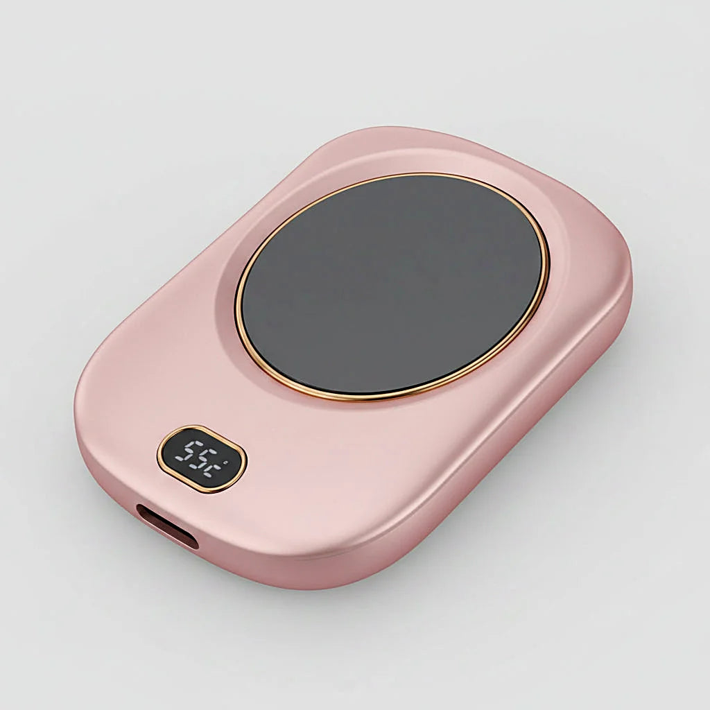 Pink mug warmer viewed from above, showing its heating plate, display, and USB port