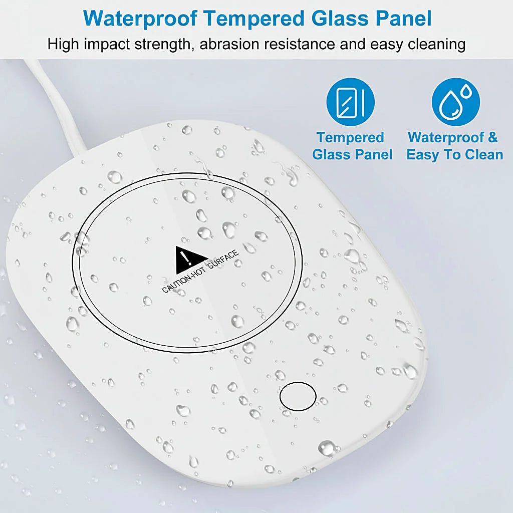 White mug warmer with water droplets on its tempered glass panel, seen from above