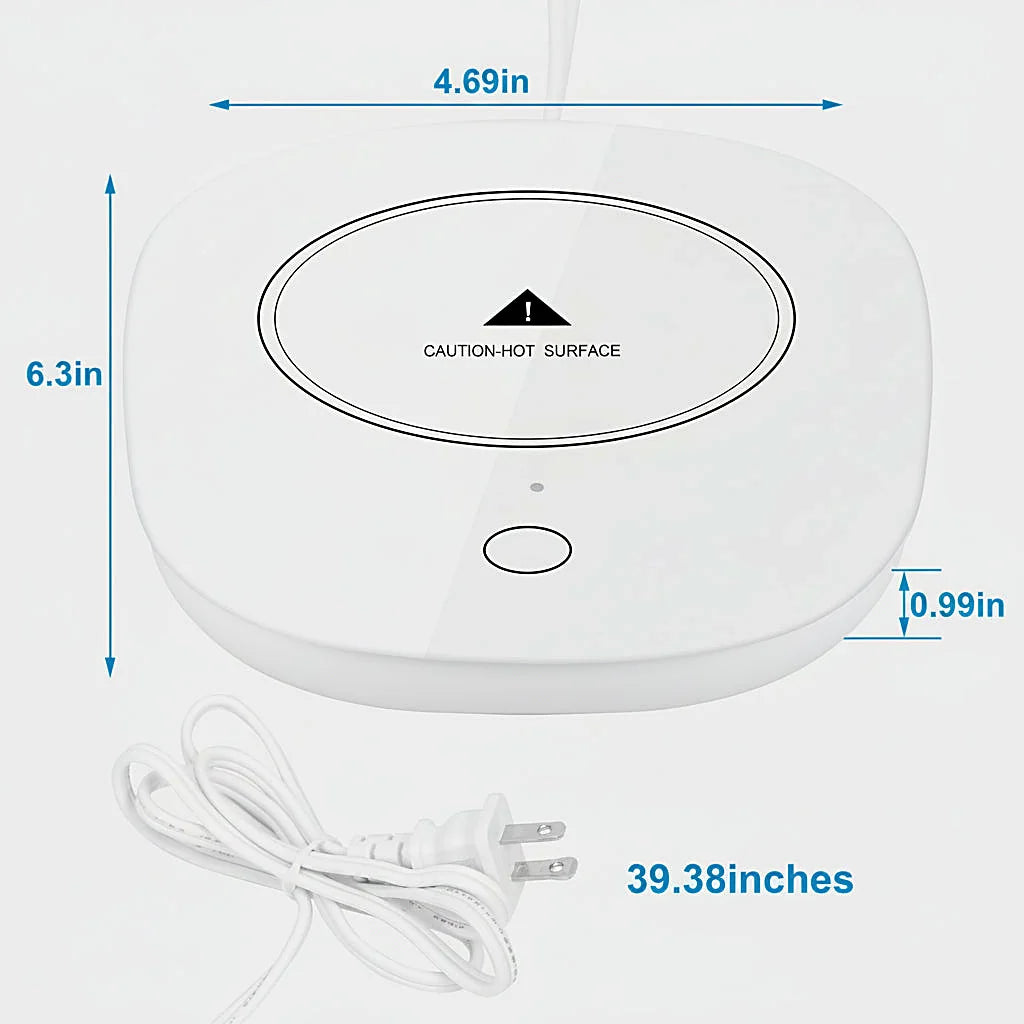 White mug warmer with its size dimensions marked, and its power cord with a US plug below