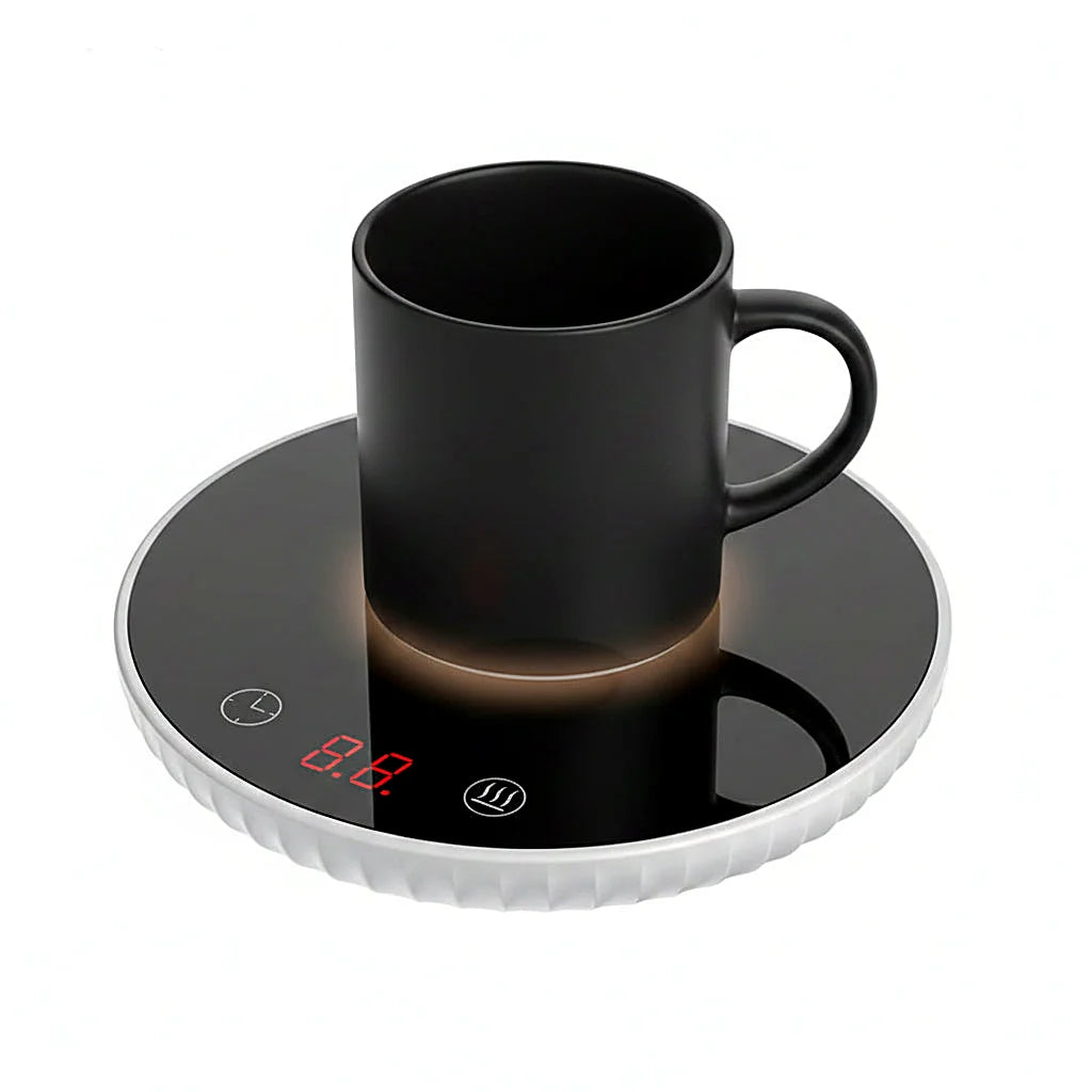 Black mug sitting on a round mug warmer with a red digital display on a white background