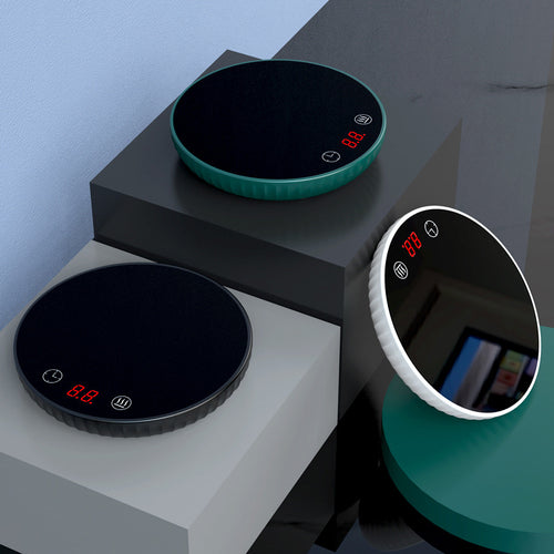 Three round electronic devices with digital displays on a geometric background